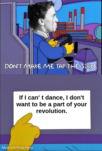 Emma Goldman taps the sign. "If I can't dance, I don't want to be a part of your revolution."